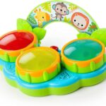 A Bright Starts Safari Beats musical drum toy featuring three colorful drums with lights, designed for babies aged 3 months a