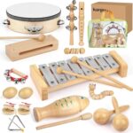A kaqinu 23-piece set of natural wood musical instruments for kids, including a xylophone, tambourine, and various percussion