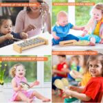 A kaqinu 23-piece set of natural wood musical instruments for kids, including a xylophone, tambourine, and various percussion